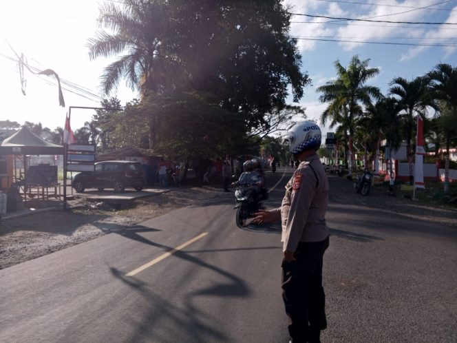 
 Jaga ketertiban lalu lintas, Aiptu H. Sulihim lakukan pengaturan pagi