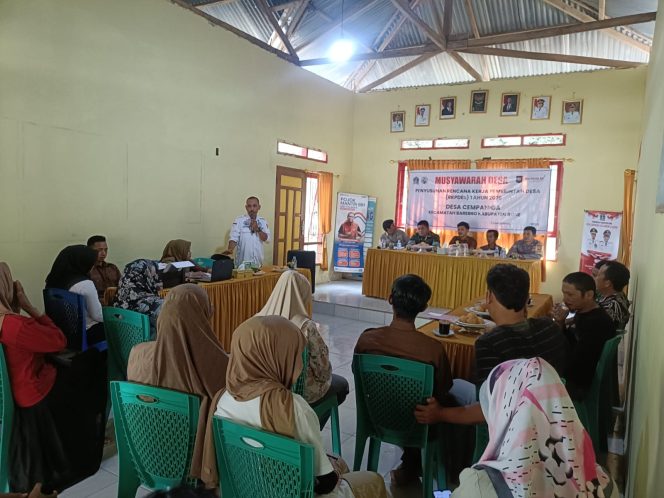 
 Bhabinkamtibmas Aiptu Andi Patonangi Hadiri Musyawarah Desa Penyusunan RKPDes Tahun 2026 di Desa Cempaniga