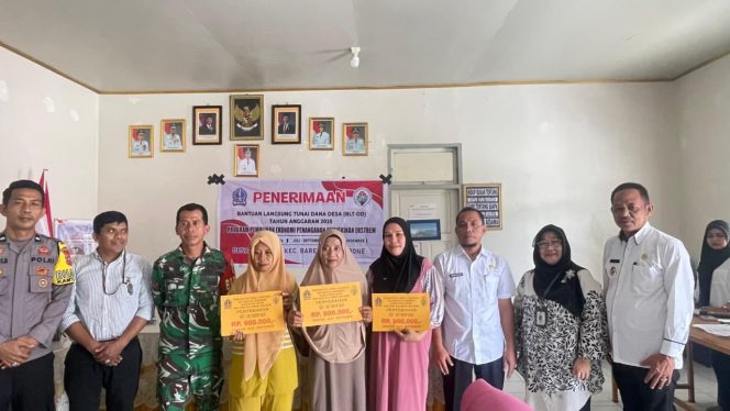 
 Pastikan Aman Dan Lancar Bhbainkamtibmas Hadiri Penyaluran BLT-DD Desa Corawali