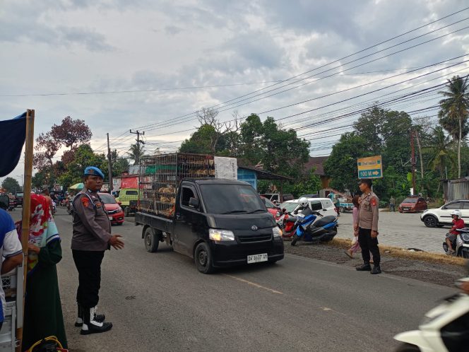 
 Wakapolsek Awangpone Memimpin Pengamanan di Pasar Paccing Jelang Idhul Fitri 1447 H