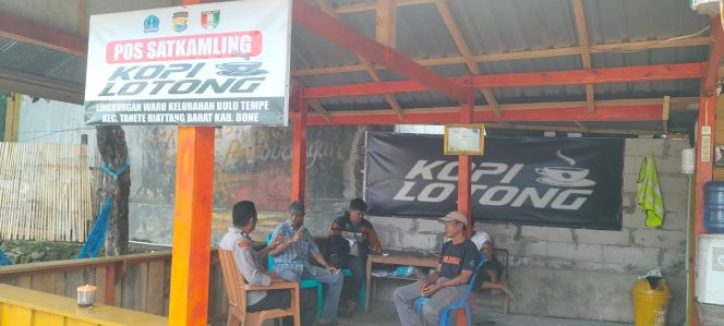 
 Sambangi Pos Satkamling Kopi Lotong, Aiptu Ulpiadi Ajak Warga Perkuat Keamanan Lingkungan