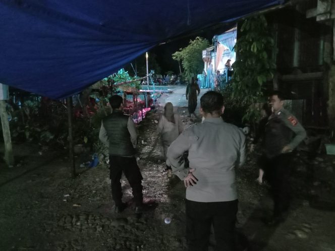 
 Personel Polsek Ulaweng Laksanakan Pengamanan Pesta Pernikahan, Ciptakan Situasi Aman dan Kondusif