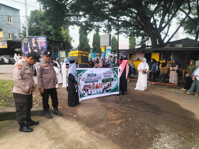 
 Personel Polsek Ajangale Laksanakan Pengamanan dan Pengawalan Pawai Menyambut Tahun Baru Islam 1 Muharram 1448 H