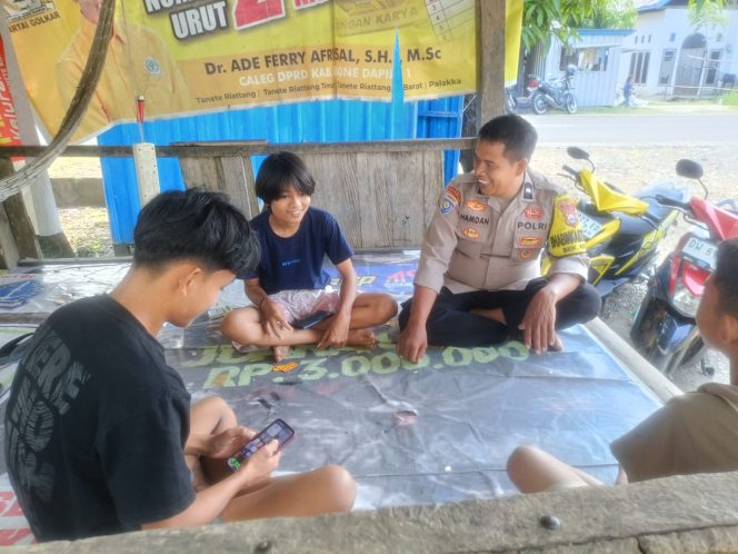 
 Senyum Anak, Semangat Pengabdian Bhabinkamtibmas di Tengah Masyarakat