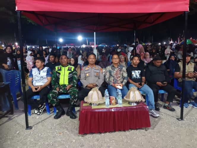 
 Kapolsek Ulaweng Hadiri Pembukaan Malam Kesenian Perkemahan HUT RI ke-81 di Lapangan Andi Makkulawu Tacipi