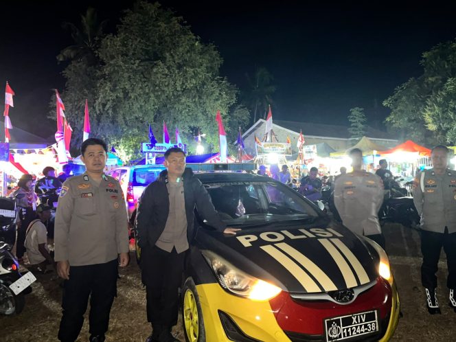 
 Personel Polsek Ulaweng Lakukan Pengamanan Malam Terakhir Perkemahan Pramuka di Lapangan Andi Makkulawu