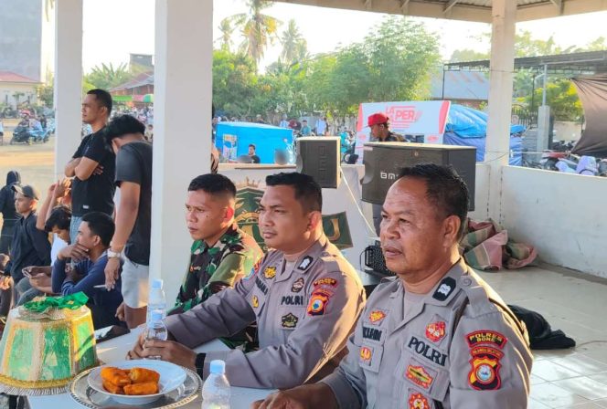 
 Aiptu H. Sulihim Pimpin Kegiatan Pengamanan dan Pengawalan Pertandingan Mini Soccer di Desa Lamuru